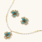 Blooming Sapphire Set gold necklace and earrings on white background