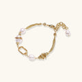 Golden Pearl Chain Bracelet with pearls and gold chain on white background