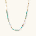Seafoam Dreams Necklace with gold chain and green stones on white background