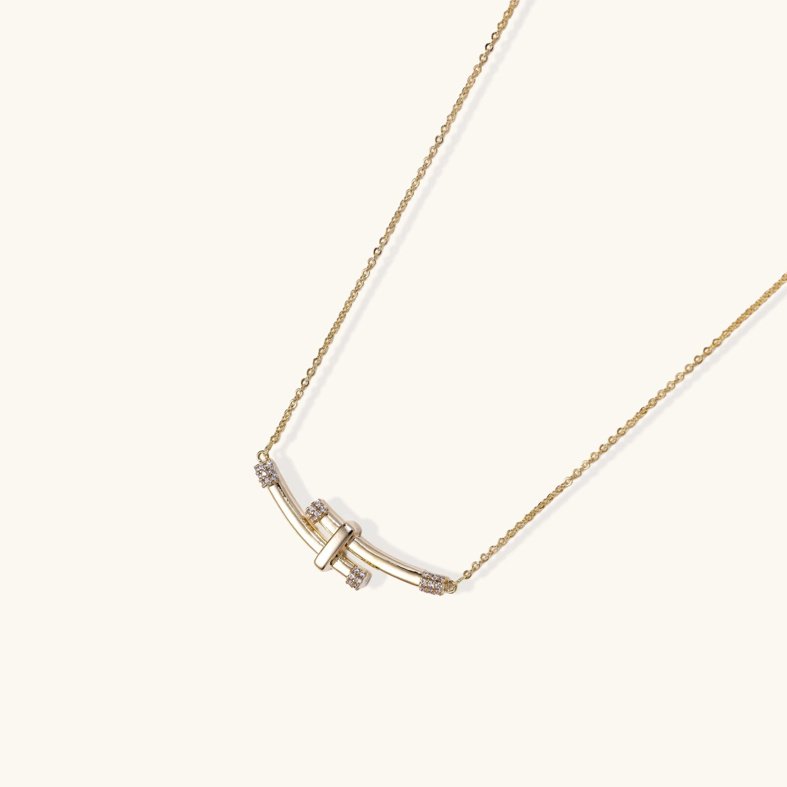 Bamboo Crystal Arc Necklace gold jewelry on plain white background