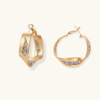 Cosmic Circle Set gold hoop earrings with pavé details on plain background