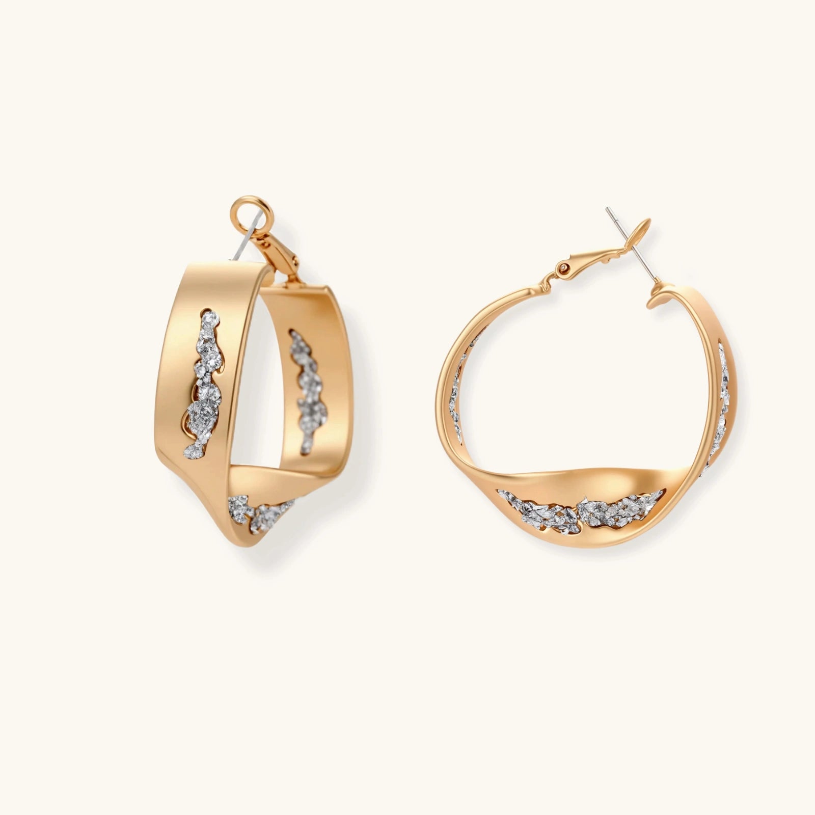 Cosmic Circle Set gold hoop earrings with pavé details on plain background