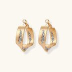 Cosmic Circle Set gold hoop earrings with pavé details on plain background