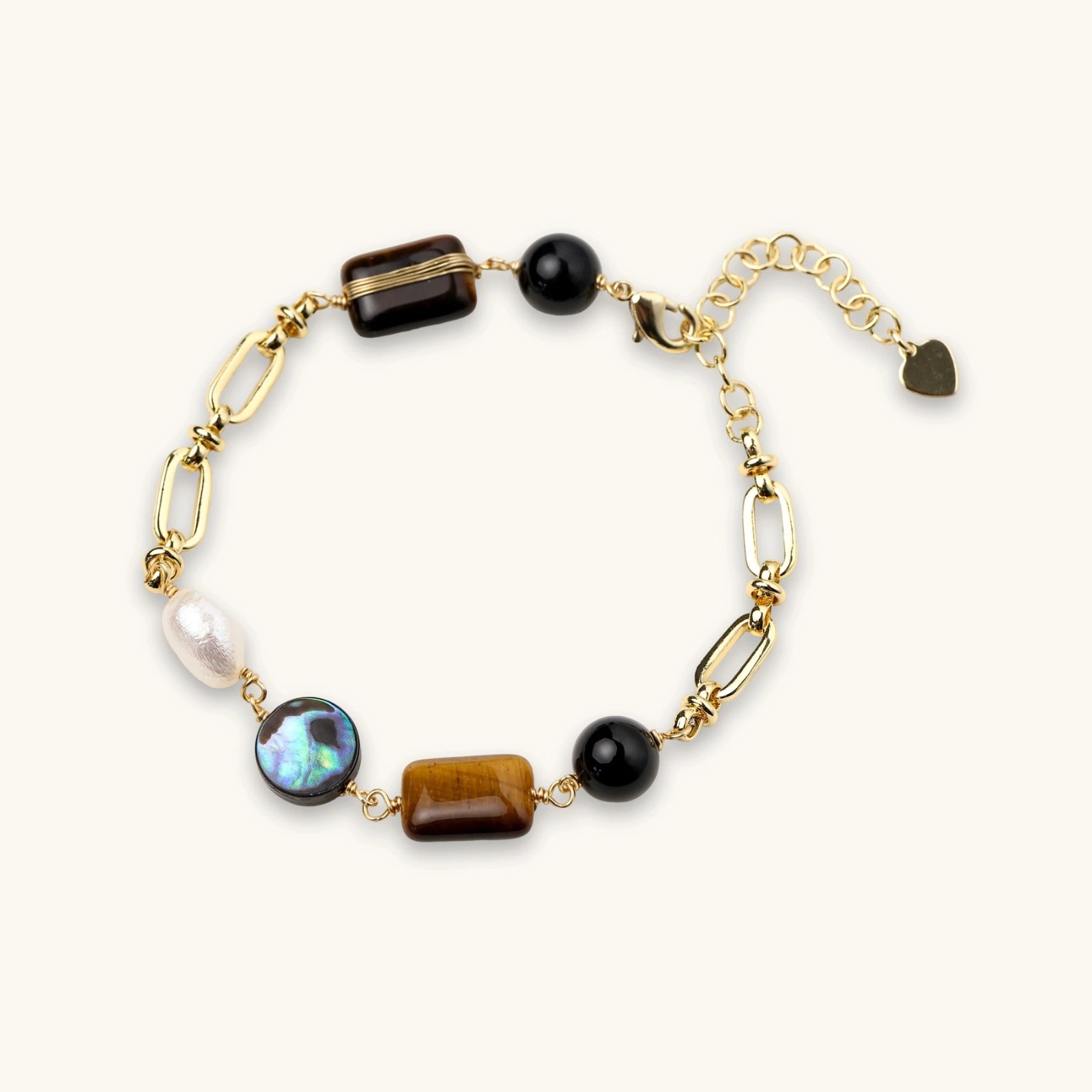 Earth Elements Bracelet with gold chain and mixed stones on white background