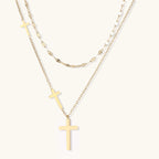 Divine Layers Cross Necklace Set gold layered necklace on white background